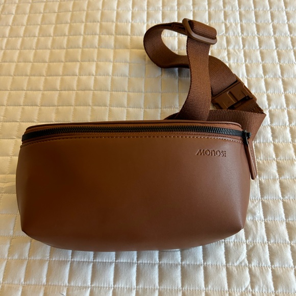 MON1500 Crafted with water-resistant, ultra microfiber vegan leather, the - Picture 5 of 10